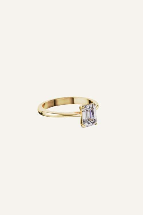 Clara emerald cut engagement ring in Fairmined 18-karat gold